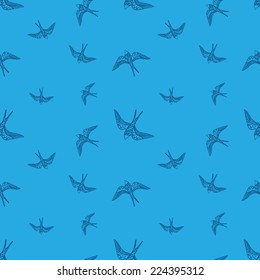 Vector doodle blue swallow birds seamless pattern 
