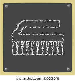 Vector doodle chalk drawn cleaning brush icon on school blackboard 