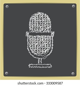 Vector doodle chalk drawn retro microphone icon on school blackboard 