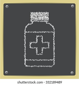 Vector doodle chalk drawn tablet bottle on school blackboard . Health icon 