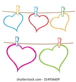 Vector doodle frames for text or photo, hanging on clothesline.