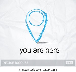 Vector doodle map pin on crumpled paper