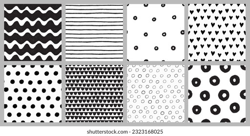 Vector doodle patterns set. Seamless backgrounds created digitally with a tablet. Hand drawn wave, striped, hearts, circle, doughnut and round patterns
