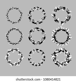 Vector doodle set of black and white flower wreath. Isolated frame decoration with flowers, leaves and blossoms on white background.
