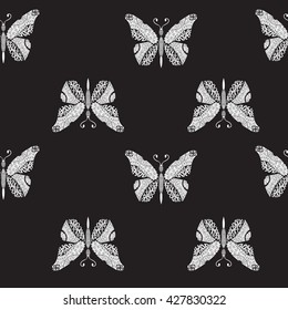 Vector doodle style Seamless pattern with flying butterflies on a black background, hand drawing- illustration.