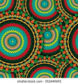 Vector doodles seamless texture with a bright circular ornament. Background template for web design, wallpapers, covers, textile.