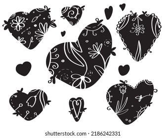 Vector doodles set - black boho hearts on white. Floral design.