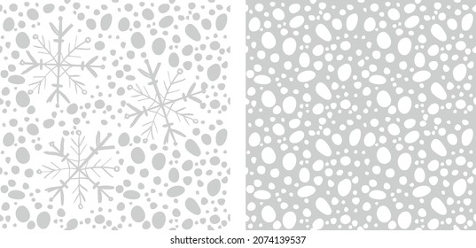 vector dots and snowflakes in scandinavian style. snowfall seamless pattern. white snowflakes on a gray background.