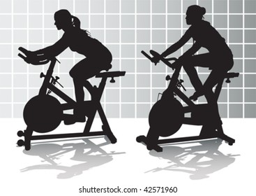 Vector drawing athletes on simulators. Silhouettes on white background