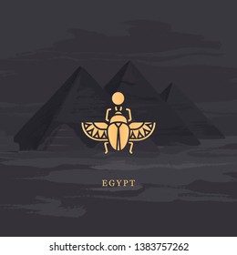 Vector drawing icon of Egyptian scarab beetle, personifying the god Khepri. Icon isolated on background illustration of Egyptian pyramids painted by hand.