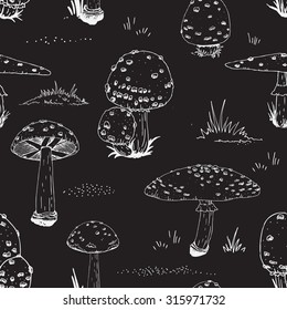 vector drawing ink mushrooms, toadstools on a dark background, simple vector