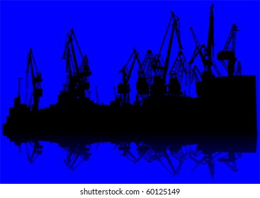 Vector drawing large cranes on a blue background