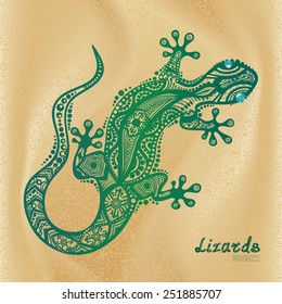 Vector drawing of a lizard with ethnic patterns of Aboriginal Australia. On the background of sand and waves. Image lizard as a tattoo.