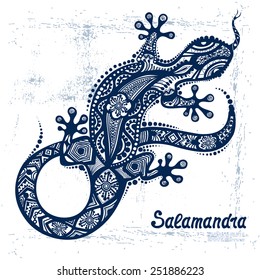 Vector drawing of a lizard or salamander  with ethnic patterns of Aboriginal Australia. On the grange background. Image salamandy as a tattoo.
