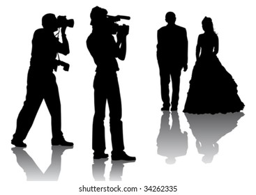 Vector drawing of photographers at a wedding. Silhouettes on a white background