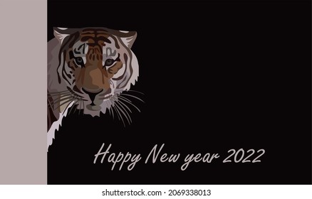 vector drawing of the silhouette of a tiger, the symbol of 2022 on a black background