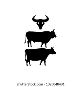 vector drawing silhouettes of cows and a bull