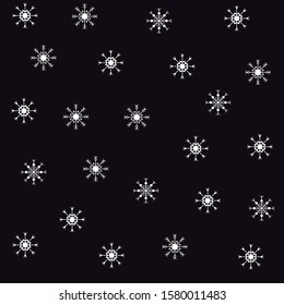 Vector drawing of snowflakes on a black background.