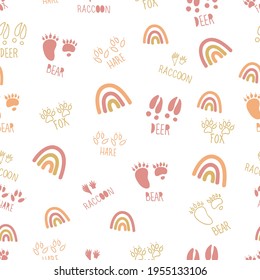 Vector earth tones forest animals tracks boho rainbows seamless pattern background. Perfect for fabric, wallpaper, scrapbooking, stationery, invitation projects.