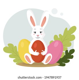 Vector. Easter bunny holding a colored egg. He has fluffy big white ears. There are two more colored eggs behind him and leaves in the background. Flat style illustration.