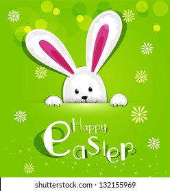 Vector Easter bunny looking out a green background