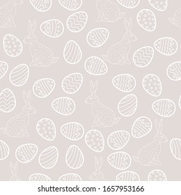 Vector of Easter seamless pattern with eggs and bunny.White outline on beige background