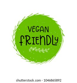 Vector eco, bio green logo or sign. Vegan  healthy food badge, tag for cafe, restaurants, products packaging. Hand drawn leaves, branches, plant elements with lettering. Organic design template.