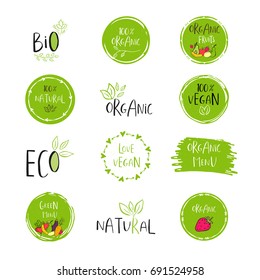 Vector eco, bio green logo or sign. Vegan, raw, healthy food badge, tag for cafe, restaurants, products packaging. Hand drawn plant elements with lettering. Organic design template.