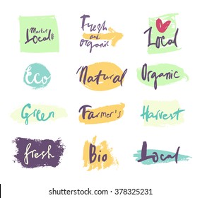Vector eco natural organic bio local labels over brushed splashes