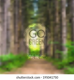 Vector ecological blurred illustration with road, trees and label "Go green"