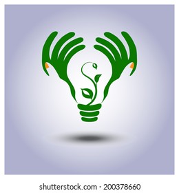 Vector ecology green light bulb with sprout in hands