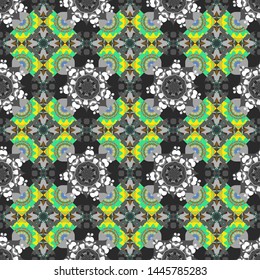 Vector eco-styled background. Seamless impressive Mandalas pattern. Abstract yellow, green and gray psychedelic print. Fabric, wallpaper, cloth and textile design. Modern urban dazzle paint.