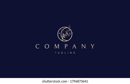 Vector elegant golden logo abstract image of a rose bush on a background of the moon.