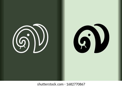 Vector of elephant logo design curve linear and silhouette icon minimal style.Creative simple animal on green background for business artwork.Modern flat icon elephant head shape graphic illustration.
