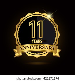 vector emblem 11th anniversary logo with ribbon golden colored and shiny badge