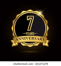 vector emblem 7th anniversary logo with ribbon golden colored and shiny badge