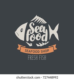 Vector emblem or banner for seafood shop with decorative fish, inscription seafood and words fresh fish on the dark background in retro style.