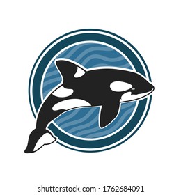 Vector emblem with black whale and sea waves isolated on white background