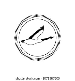 Vector emblem with hand drawn flying wild goose. Beautiful animal design elements, ink drawing.
