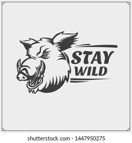 Vector emblem with wild boar for sport club. Print design for t-shirt.