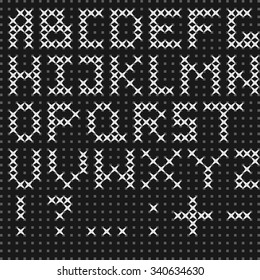 Vector embroidered alphabet on black canvas. Simple black and white design, good element for vector hand-made cards
