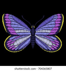 Vector embroidery butterfly. Embroidery fashion design, patches and stickers. Black background.