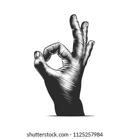 Vector engraved style illustration for posters, decoration and print. Hand drawn sketch of hand ok sign in monochrome isolated on white background. Detailed vintage woodcut style drawing.