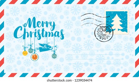 Vector envelope on the theme of Christmas and New year with postage stamp and postmark. Calligraphic inscription Merry Christmas with Christmas toys and angel on snowflakes background.