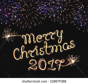 VECTOR eps 10. Glowing collection. 2017 New Year design! Merry Christmas design! Shining Firework, light effects and lettering hand drawn text Merry Christmas  2017, Vector Christmas Design
