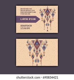 Vector ethnic business card template with tribal geometric element.