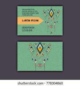 Vector ethnic business card template with tribal geometric element.