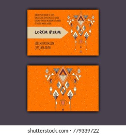 Vector ethnic business card template with tribal geometric element.