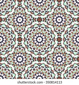 Vector ethnic colorful bohemian pattern in mint colors with big abstract flowers. Geometric background with Arabic, Indian, Moroccan, Aztec motifs. Bold print with stars, mandalas, triangle, polygon