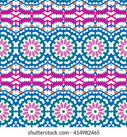 Vector ethnic colorful bohemian pattern in bright colors with big abstract flowers. Geometric background with Arabic, Indian, Moroccan, Aztec ethnic motifs. Bold tribal print for fall winter fashion